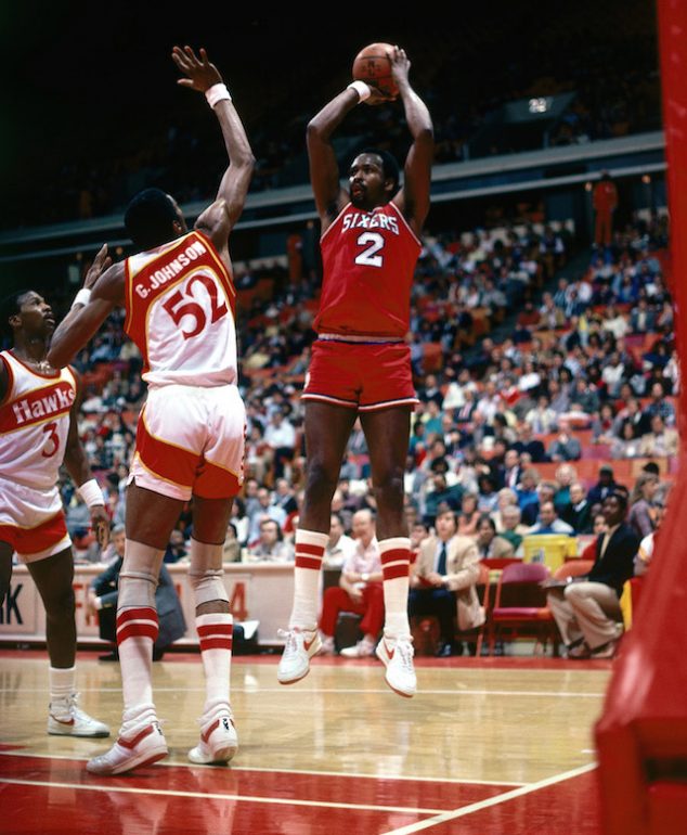 ATLANTA - 1983: Moses Malone #2 of the Philadelphia 76'ers takes a jumper against the Atlanta Hawks during the NBA game in Atlanta, Georgia. NOTE TO USER: User expressly acknowledges and agrees that, by downloading and or using this photograph, User is consenting to the terms and conditions of the Getty Images License Agreement. (Photo by Scott Cunningham/ NBAE/ Getty Images)
